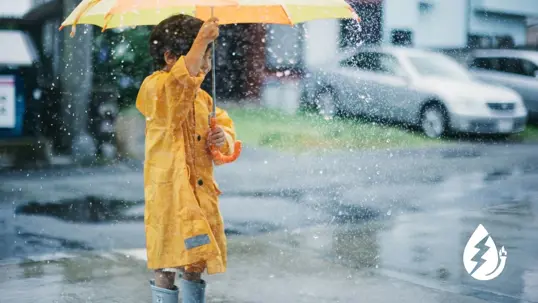 child outside home during rain